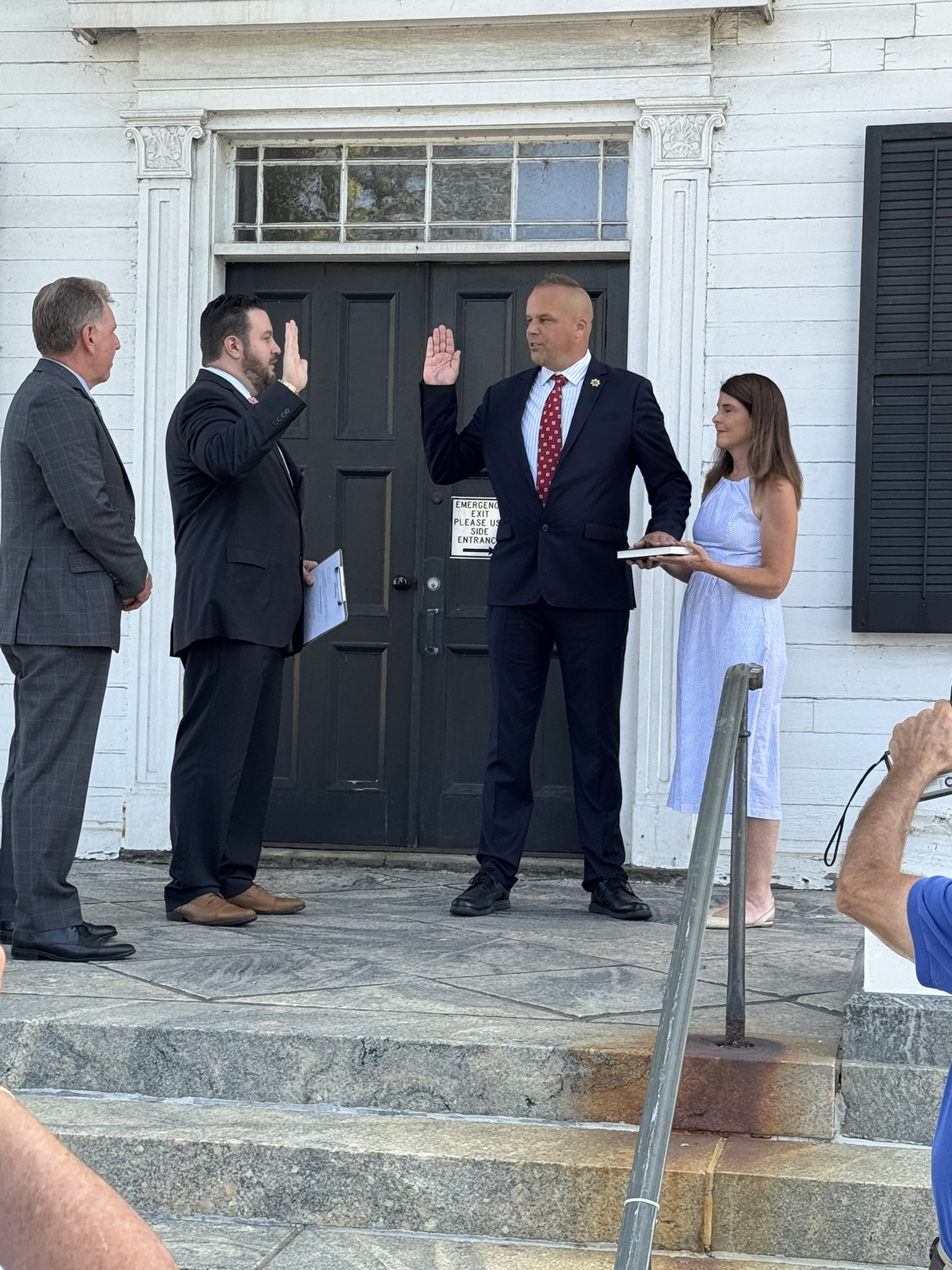 Brian Hess being sworn in